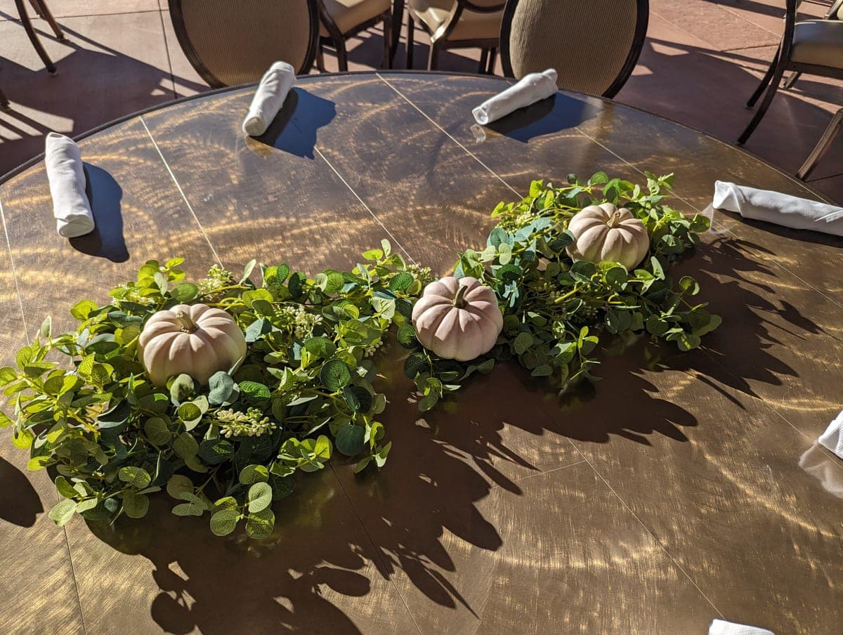 Corporate awards dinner with branded signage and floral arrangements
